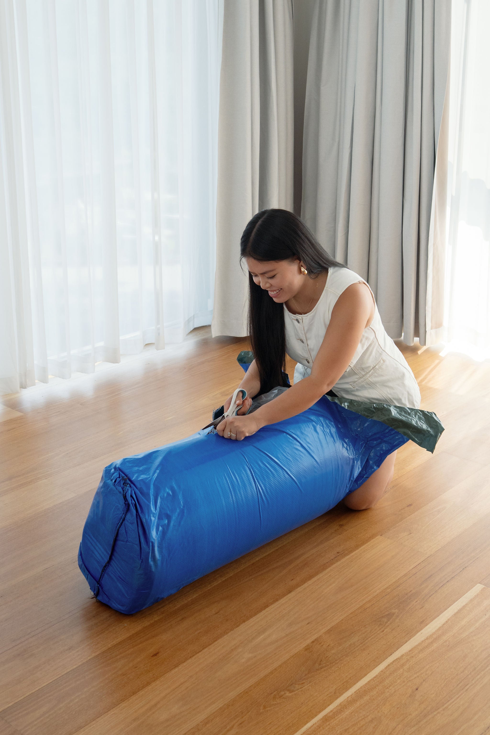 Each sofa is compressed and vacuum sealed for shipping.