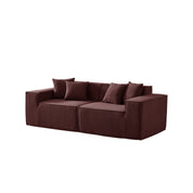 Brown sofa with cushions on a white background